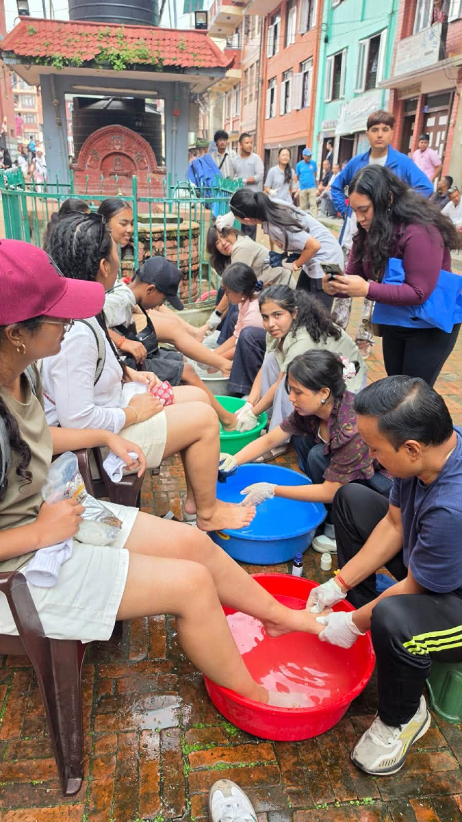 Foot Massage and first aid support to pilgrims in Mataya Procession